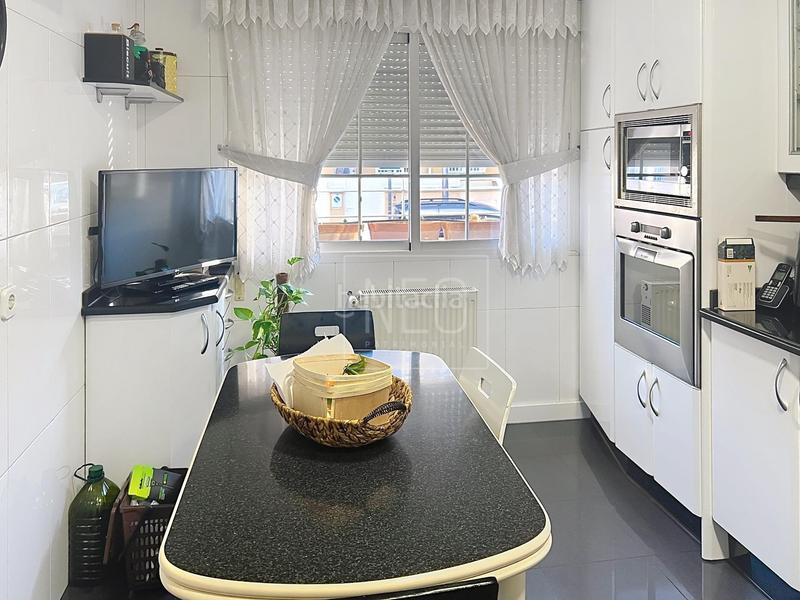 Foto f18c323f-e316-4b77-9166-178764dbf694. Reihenhaus mit heizung parking in Salvador Madrid