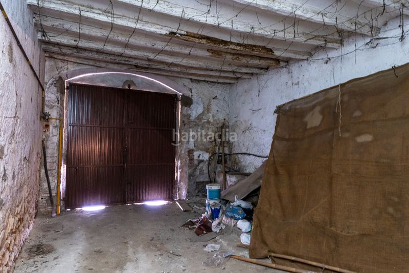 Foto bcb5d9a2-e39f-4882-a382-d0ae13db46f4. Casa adossada amb xemeneia aparcament a Vila-seca poble Vila-seca