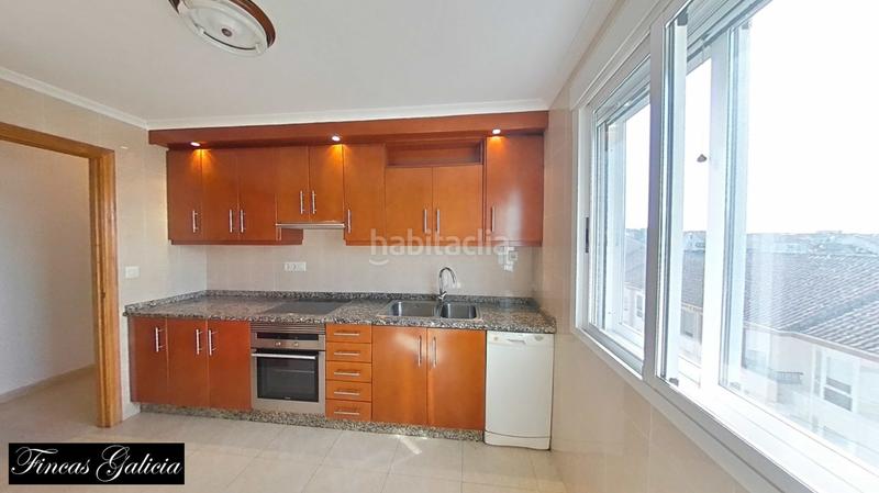 Foto 0eb6b5a5-a023-4232-9896-ca9e6197ce82. Piso  en muy buenas condiciones de uso, situado en una zona tranquila . 
con una superficie de unos 98 metros cuadrados en Verín