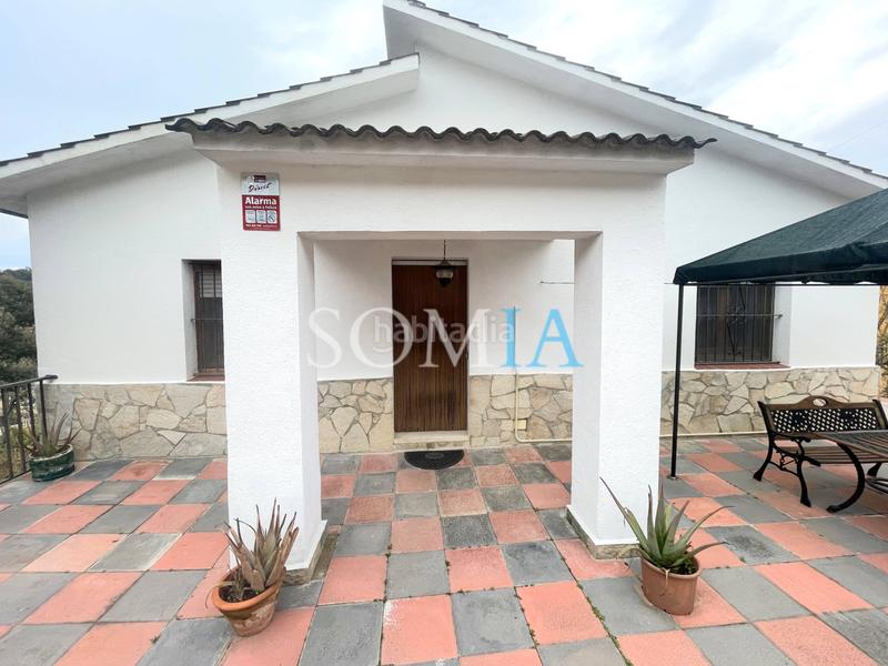 Foto 41b4359a-2a5a-4b4c-bbe0-d6419134e9e7. Casa acojedora con gran jardin en Riells i Viabrea