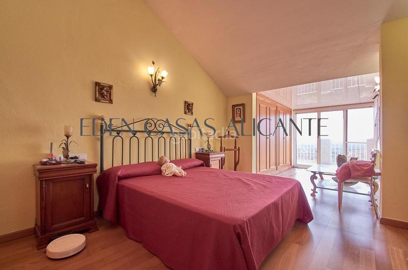 Foto ade43560-3888-4f70-a1e6-7fe2bff7e990. Casa adosada vivienda adosada con 4 habitaciones y 3 baños en urbanización con piscina y parking en Mutxamel