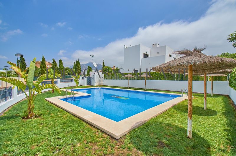 Foto df321aa3-84a6-456d-a772-d88ad6061fae. Casa aparellada amb calefacció aparcament piscina a Busot