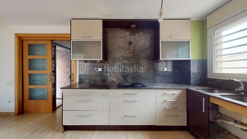 Foto 53b57e32-0527-465c-a0b2-ee0ee3fc6ca2. Casa amb aparcament a Torre Baró Barcelona