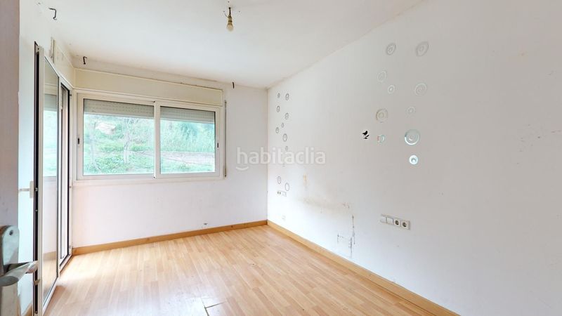 Foto a6c9820e-a102-45ba-9b3d-0e98c56e30c6. Casa amb aparcament a Torre Baró Barcelona