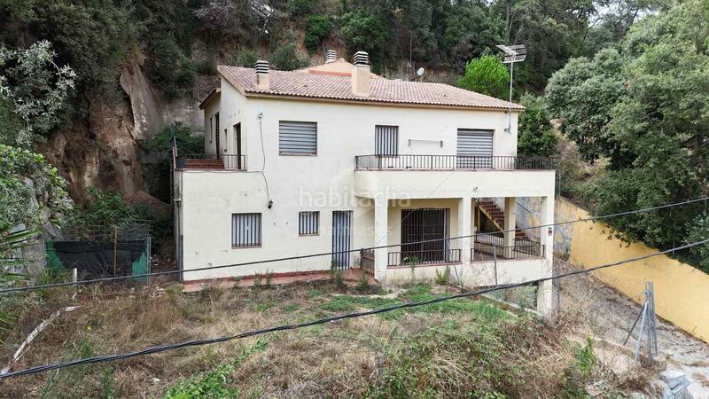 Foto 394f310f-064a-42c1-a87c-ef7f21e21b90. Casa amb aparcament a Can Massuet del Far Dosrius