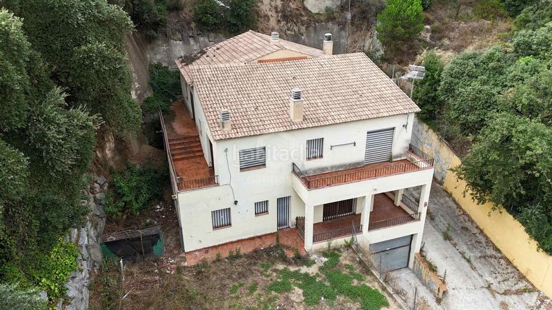 Foto 5e53240c-4b6c-4dcb-9dc2-a4481d33b9c4. Casa amb aparcament a Can Massuet del Far Dosrius