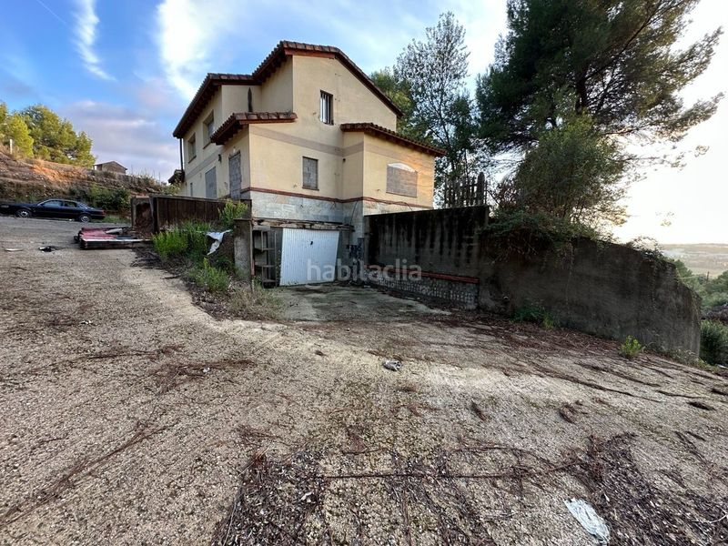 Foto c3789187-a4c6-46c5-84f2-2f54052a2063. Haus mit parking in Abrera