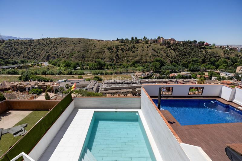 Foto 623df3a3-03b9-436e-805d-4dded5768541. Casa adossada amb calefacció aparcament piscina a Granada