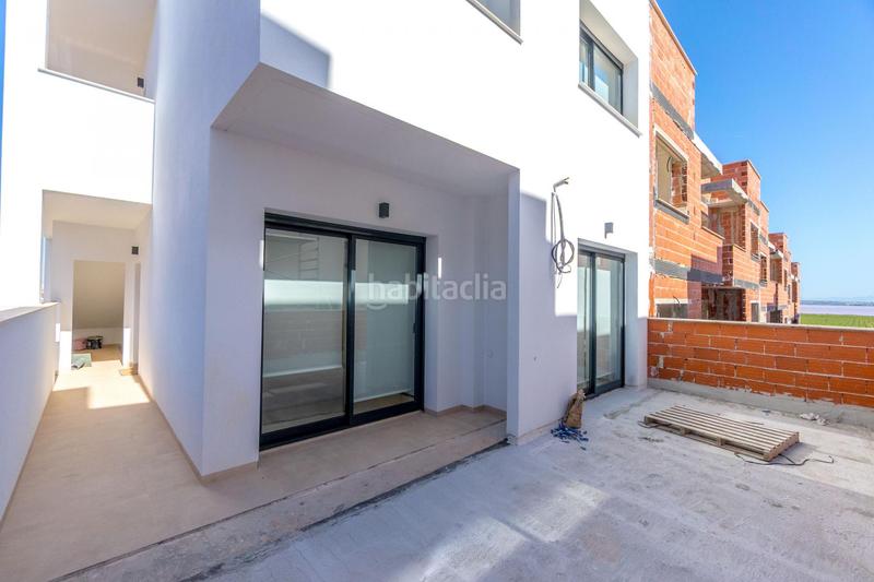 Foto fd43f708-5c0f-4582-8e54-ffbb4cdf3f2e. Semi detached house with parking pool in Los Balcones-Los Altos Torrevieja