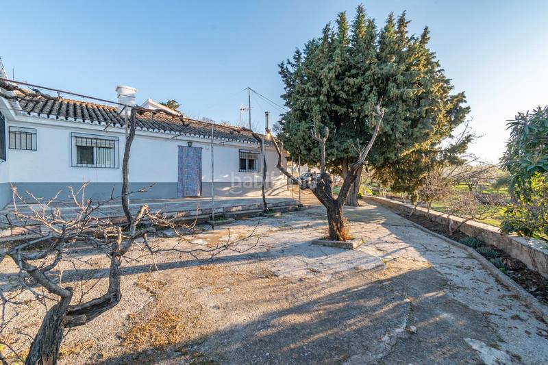 Foto 08b87ba7-352a-4d4e-9b7c-38ff631cfe58. Masía en calle las villas 31 cortijo con amplia piscina en Monachil