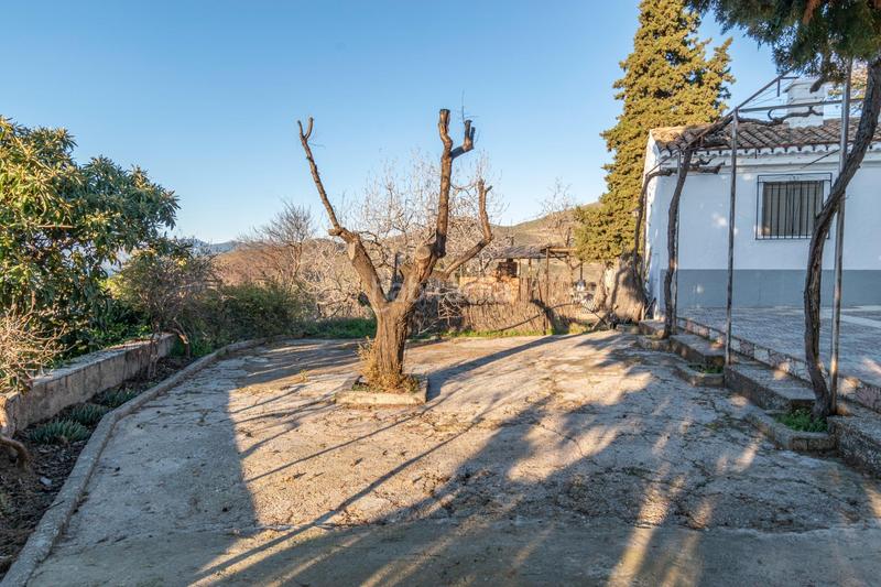 Foto 0ef9849e-f70b-447d-bdfb-8722e8979f96. Masía en calle las villas 31 cortijo con amplia piscina en Monachil