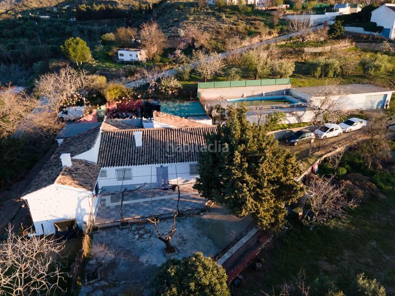 Foto ccb8b5fd-2f62-469f-8674-838d59db94a1. Masía en calle las villas 31 cortijo con amplia piscina en Monachil