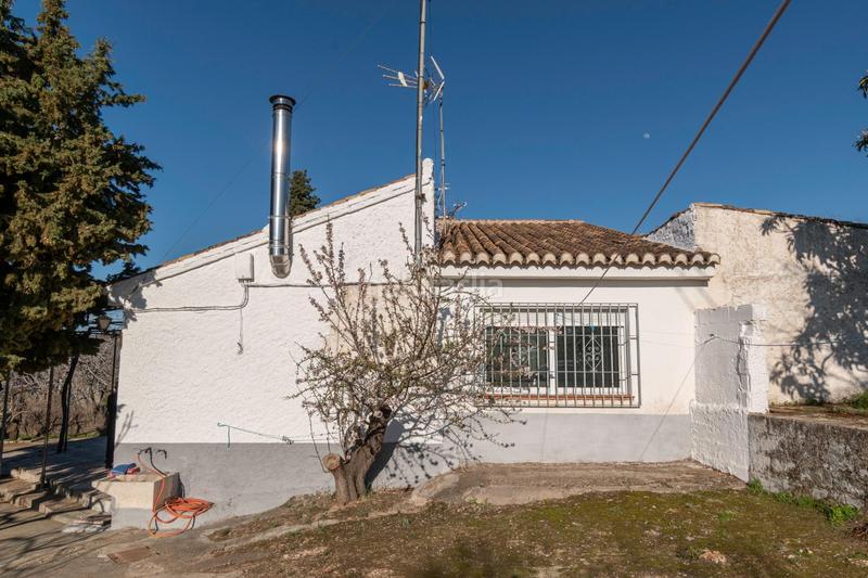 Foto f5184467-68f3-405f-8a0f-1d52dd74b05c. Masía en calle las villas 31 cortijo con amplia piscina en Monachil