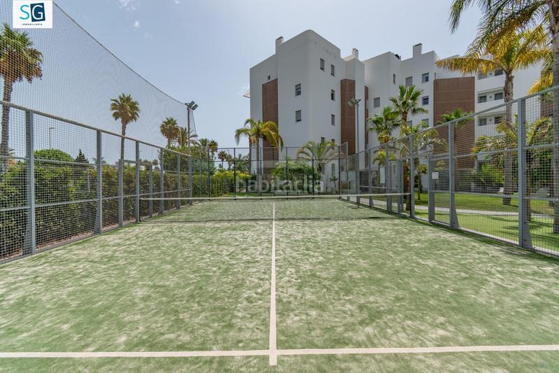 Foto 2b77241c-295a-4921-993c-e21b1af51850. Piso descubre este espectacular apartamento ubicado en el prestigioso residencial mar de astrid, una joya frente a la hermosa playa gra en Motril