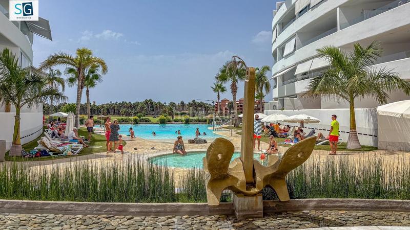 Foto 3720b0bf-951f-4b3a-a954-40f84dc77e32. Piso descubre este espectacular apartamento ubicado en el prestigioso residencial mar de astrid, una joya frente a la hermosa playa gra en Motril