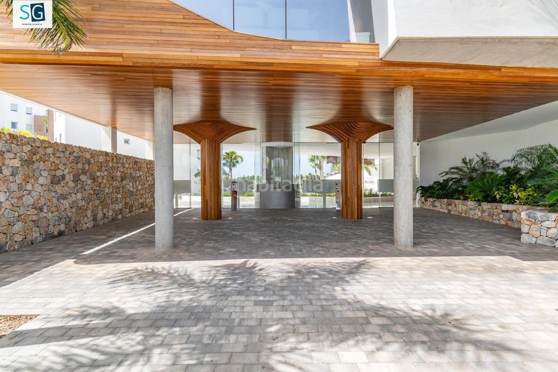 Foto 89d51c54-6f59-4624-948d-f209139f2e74. Piso descubre este espectacular apartamento ubicado en el prestigioso residencial mar de astrid, una joya frente a la hermosa playa gra en Motril