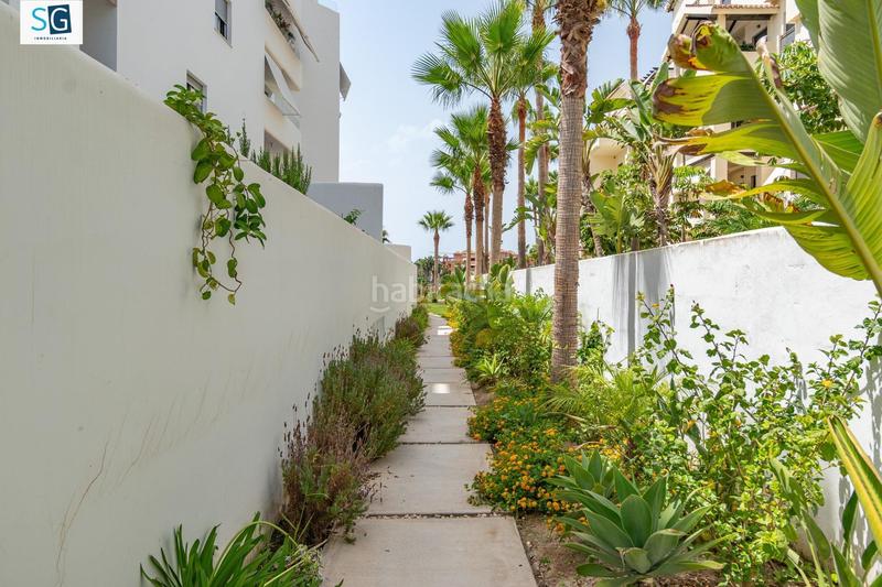 Foto c024d83a-5db8-4d94-9cc9-6ea17f604d68. Piso descubre este espectacular apartamento ubicado en el prestigioso residencial mar de astrid, una joya frente a la hermosa playa gra en Motril