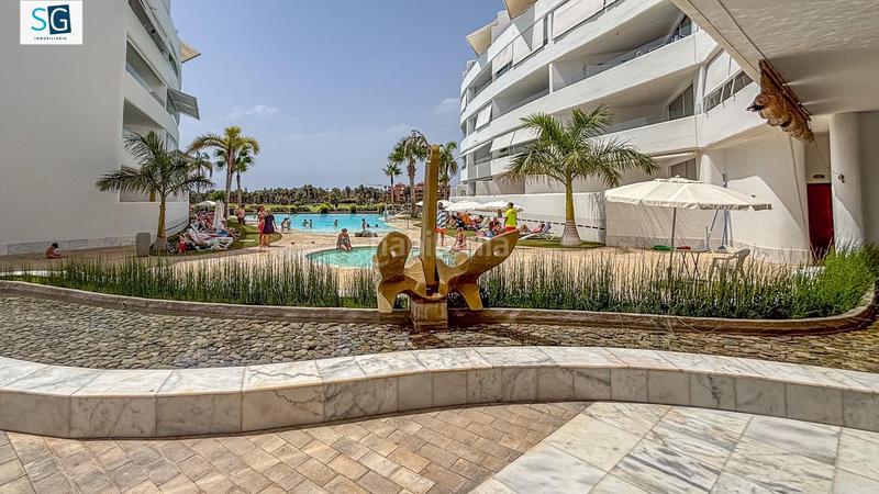 Foto f54af6d2-2553-4668-b18e-a7ea3e5fd4d2. Piso descubre este espectacular apartamento ubicado en el prestigioso residencial mar de astrid, una joya frente a la hermosa playa gra en Motril