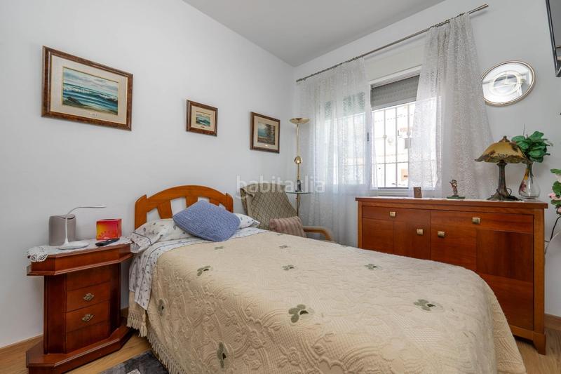 Foto a53a4521-dbb1-4980-9646-b497e7fa56b0. Casa adossada amb aparcament piscina a Belicena Vegas del Genil