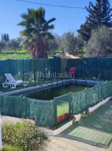 Foto c5c67b8d-7b66-46bc-9376-1a07efd04bf5. Country house with pool in Centro Alhaurín el Grande
