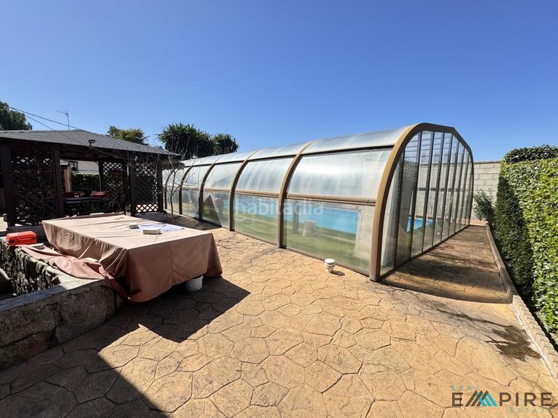 Foto a6e403d7-2c46-4222-8576-85aebe0d51d5. Haus mit heizung parking pool in Serranillos del Valle