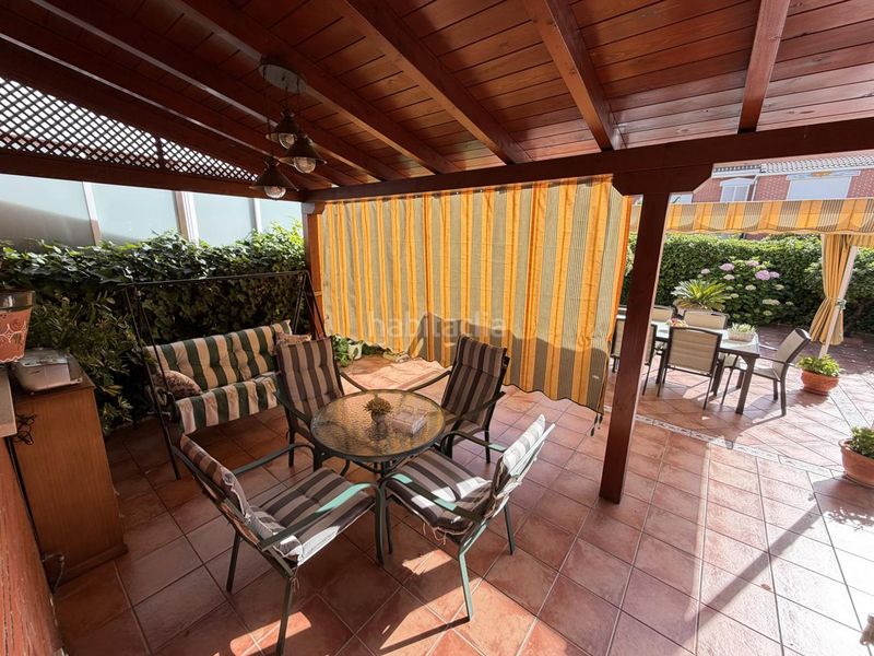 Foto b3d56926-4b1f-431d-bf13-cb16c862c389. Casa adossada amb calefacció aparcament a Las Américas Parla