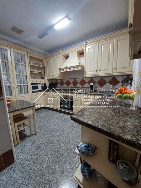 Foto 77349526-c971-4f5c-82cd-e34ab6f081f8. Casa adosada en Centro Lucena