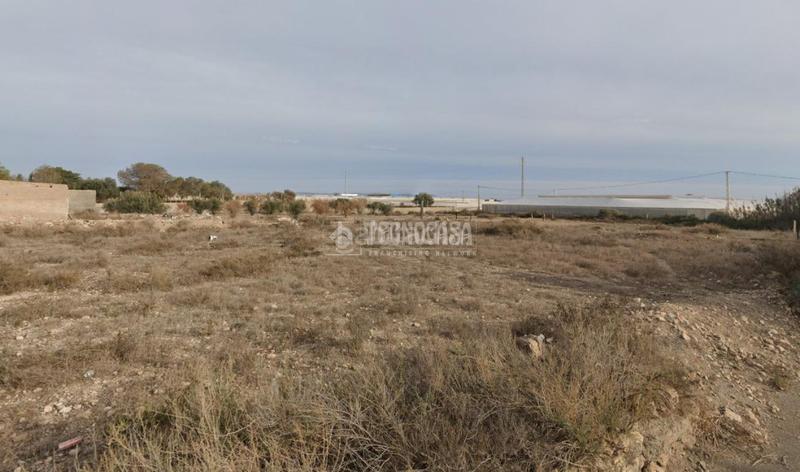 Foto 1e38cb12-51ab-4ce4-bbb0-445560b8b7da. Finca rústica terrenos en venta en Costacabana - Loma Cabrera Almería