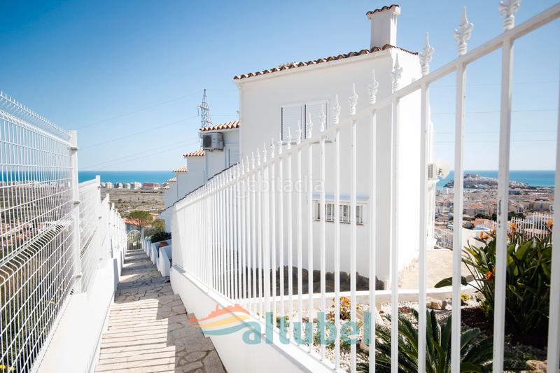 Foto 9b2f14d4-8e87-4cea-b863-ad2c9b78cdb1. Casa adosada en avinguda d'irlanda 56 en Las Atalayas-Urmi-Cerro Mar Peñíscola