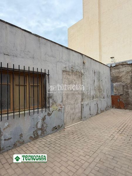 Foto b8d6f845-b10c-4b66-bdc7-d93f6fb2ac4d. Casa aparellada a Adra