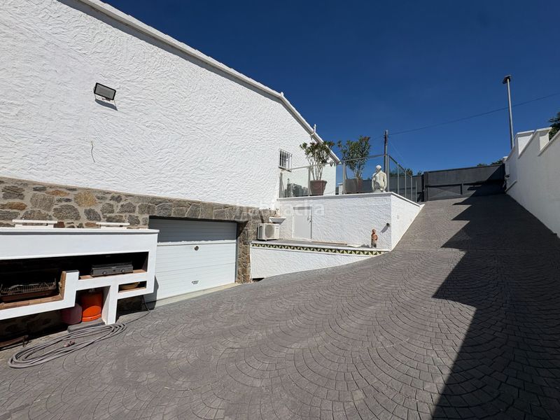Foto 0c634524-2209-4020-b88c-f9d13c245dde. Casa amb xemeneia calefacció aparcament piscina a Roses