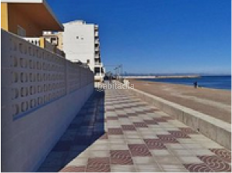 Foto b8b1024c-d724-4572-89fb-7c78a9406e17. Autoparkplatz in El Perelló Sueca