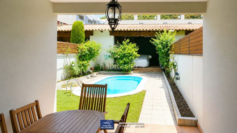 Foto fb7e33a7-456d-475e-8ea1-f45521e1d85c. Casa adossada amb calefacció aparcament piscina a Garriga (La)
