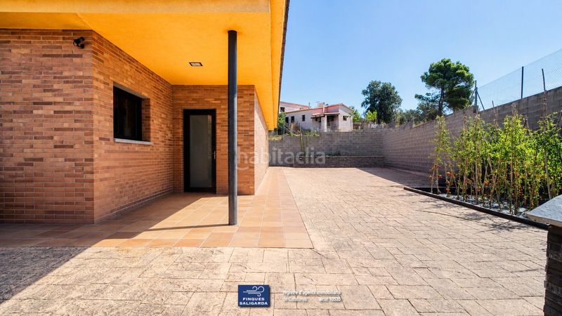 Foto 43cdc3cb-ba4a-43b5-872c-3c425f994326. Casa amb calefacció aparcament piscina a Lliçà de Vall