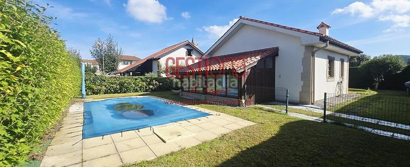 Foto 051d0593-d7a1-4d6b-8637-2fd806ee97b7. Chalet casa independiente de planta baja con piscina. Galizano en Ribamontán al Mar