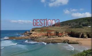 Casa aparellada en Galizano. Chalet pareado a 300m de la playa de galizano.