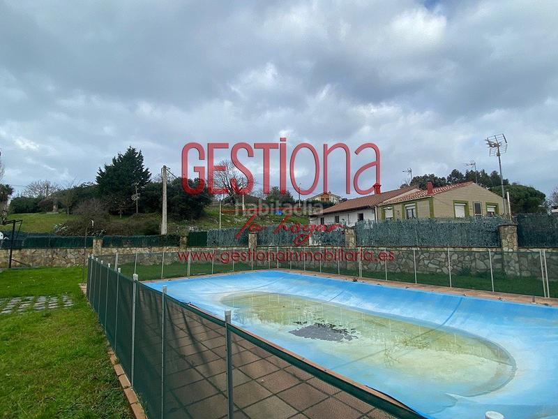 Foto 18e6f0bb-8197-4f42-b7c1-873bc84f4da4. Casa pareada impresionante pareado con piscina en Ajo en Bareyo