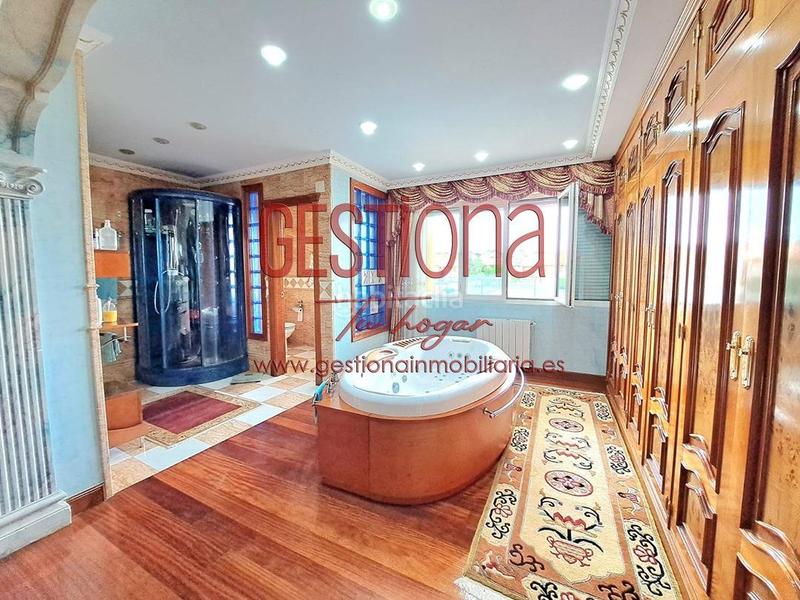 Foto 26645ff3-5705-4afc-b5b9-6f73b6c37419. Casa bifamiliare con riscaldamento parcheggio piscina in Santa Cruz de Bezana