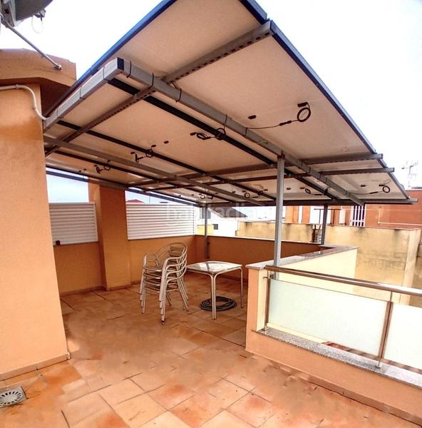 Foto 3415a2e1-dbf4-43ef-90e2-2ea7d0ac0d56. Towny house with parking pool in Playa Burriana