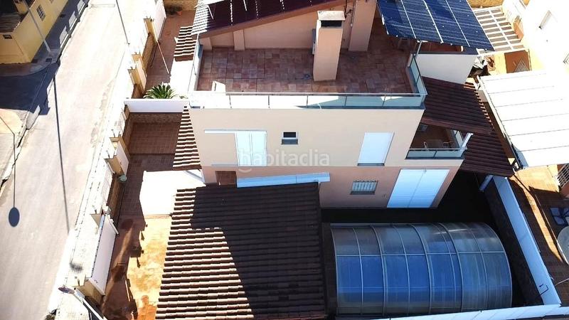 Foto 57ca8d88-44cb-46c3-9a14-bcb23880f37c. Towny house with parking pool in Playa Burriana