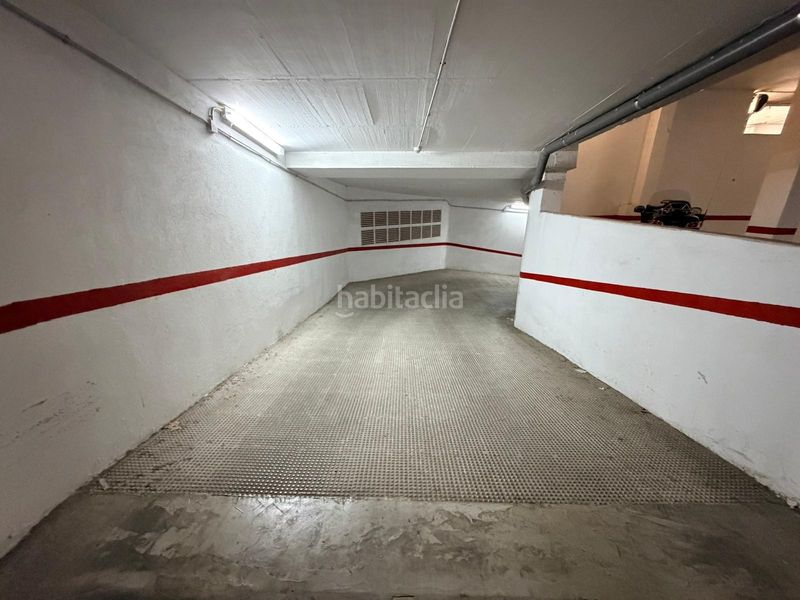 Foto cc1dbe7f-61d3-4a19-b317-ddda217e4f85. Autoparkplatz in Albaida