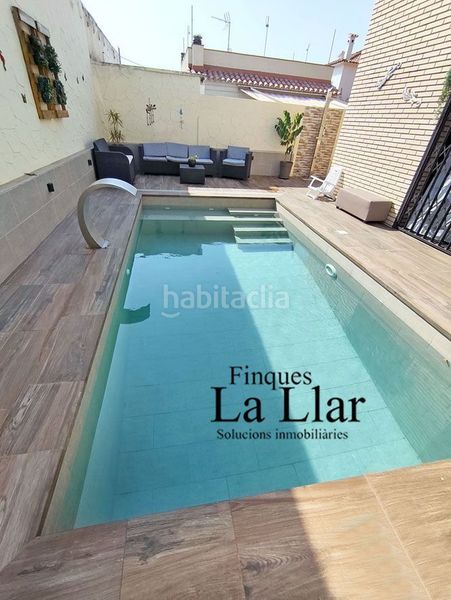 Foto f328403f-f2a9-4786-b2b2-4ed3405e065c. Casa amb calefacció piscina a Torrent Ballester Viladecans