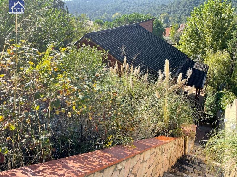 Foto aaf41261-c91a-4ae7-a03e-9f0b95df8e73. Casa  con piscina en Aiguaviva Parc Vidreres