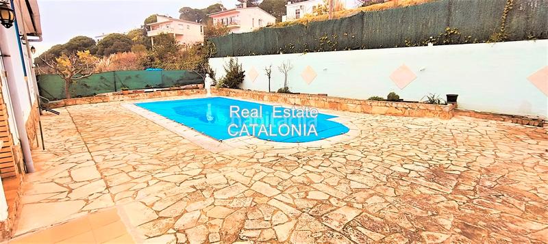 Foto 5e410f4b-65d6-47a0-bd7b-aa61ee380113. Chalet mit kamin heizung parking pool in Lloret Residencial - Montlloret Lloret de Mar