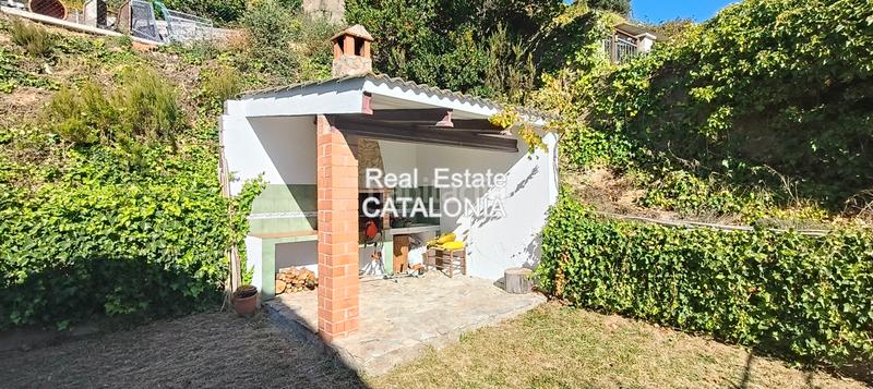 Foto 24d5957e-f3de-4809-b54d-2a8203ecb69b. Xalet amb xemeneia calefacció aparcament a Lloret Residencial - Montlloret Lloret de Mar