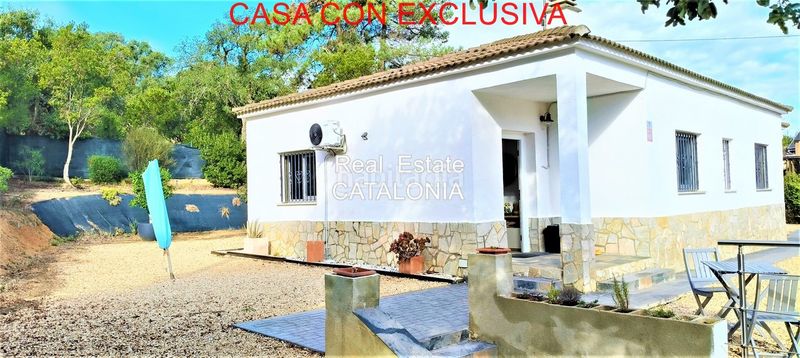 Foto 9878397f-a6b6-403f-b21d-be68eddeee5d. Chalet with fireplace heating pool in Lloret Blau - La Creu de Lloret Lloret de Mar