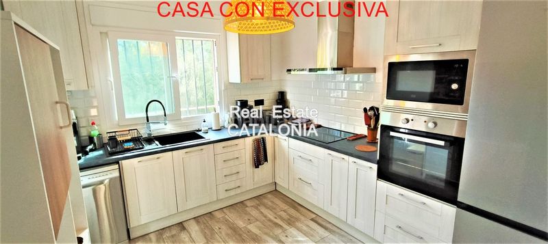 Foto f601a879-5b9b-4a04-898f-93b201d2f731. Chalet with fireplace heating pool in Lloret Blau - La Creu de Lloret Lloret de Mar