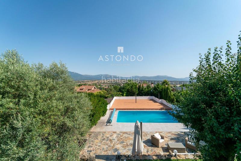 Foto bf40dc08-b3a4-4b8f-8970-bc254eae33fe. Chalet con riscaldamento parcheggio piscina in Soto del Real