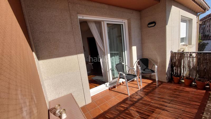 Foto 8d17071c-ff0a-4220-9040-f4cc11eaba6e. Casa a schiera con parcheggio in Sanxenxo pueblo Sanxenxo