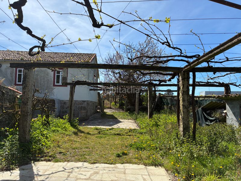 Foto c7718975-58e9-46cf-beb4-1be62f7fa1f0. Casa a Ribadumia